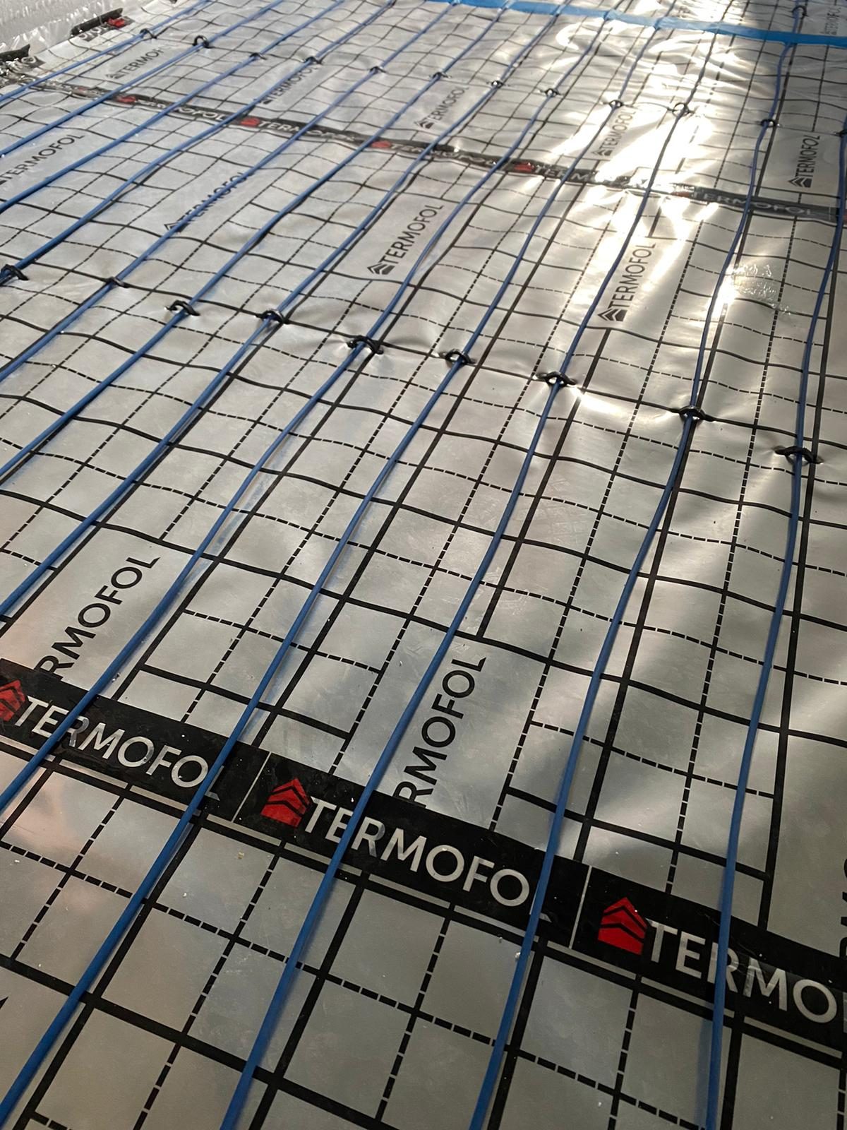 Instalace topného systému Termofol v novostavbě, Jičín