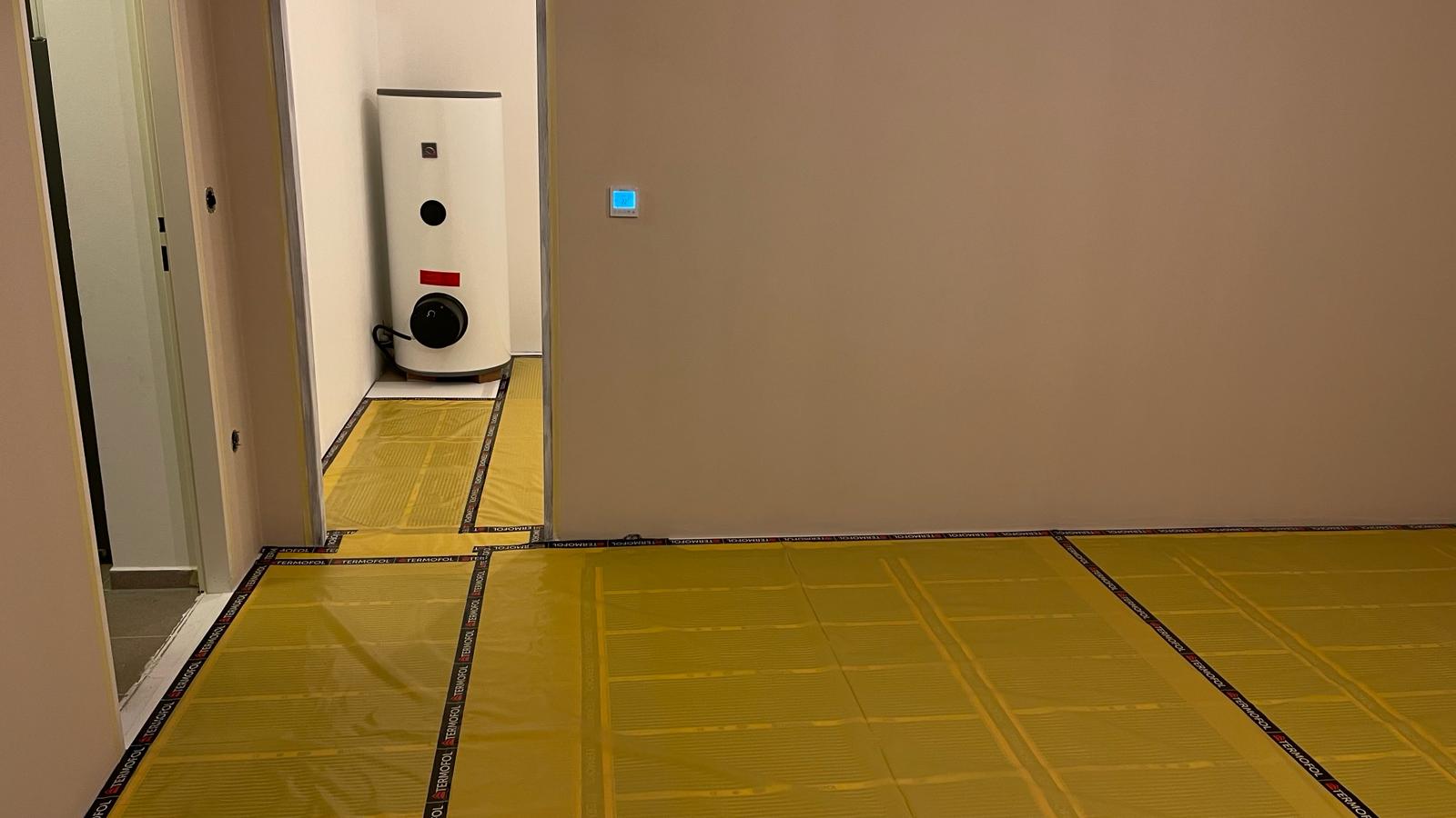 Dokončená instalace topných fólií Termofol, Praha